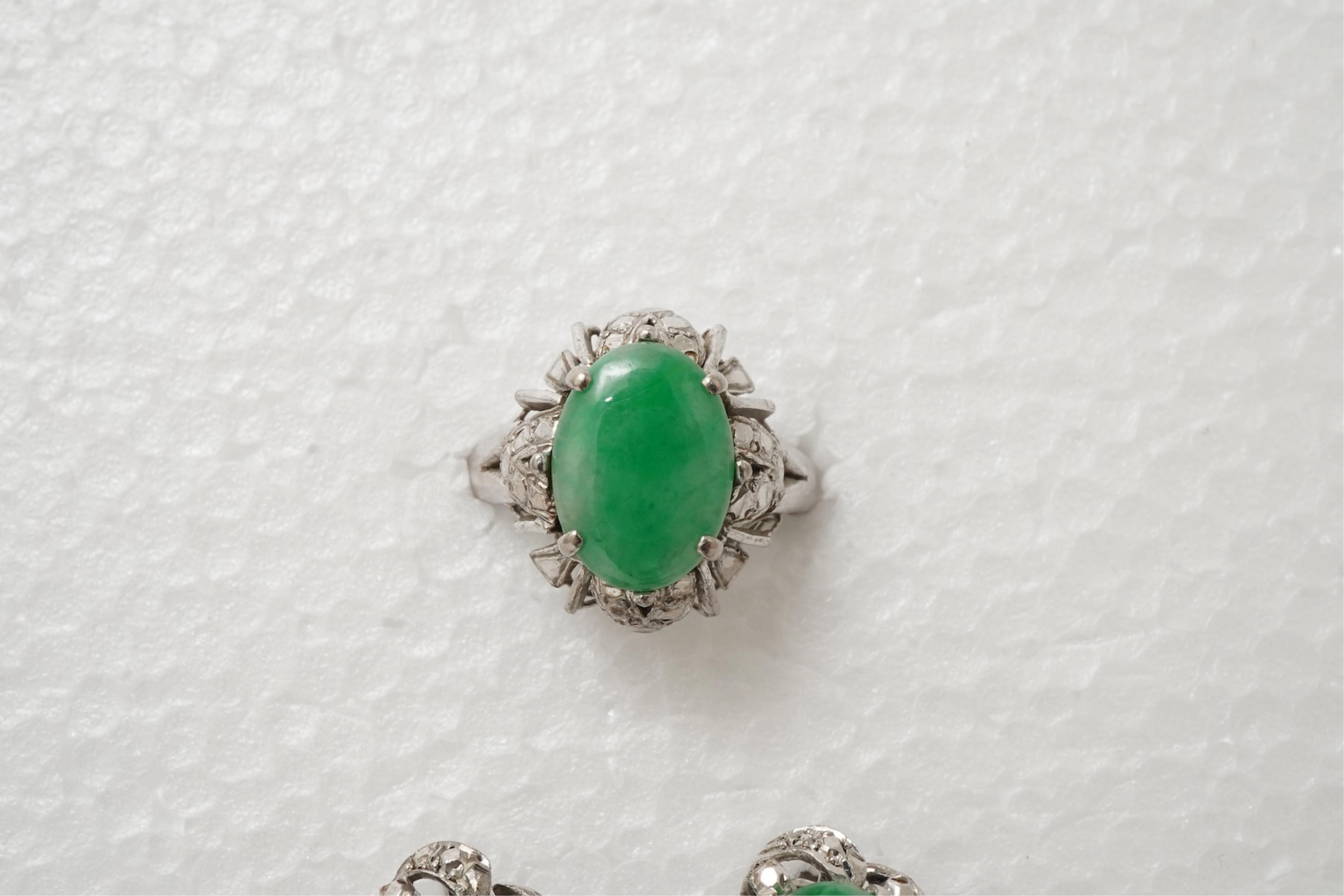 A pair of jadeite earrings and a ring